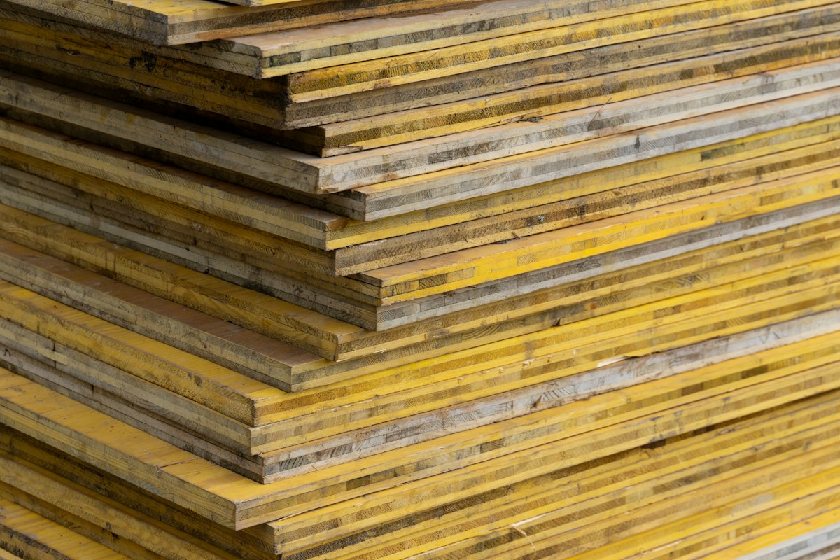 Stack of coated film faced plywood panels used for concrete formwork